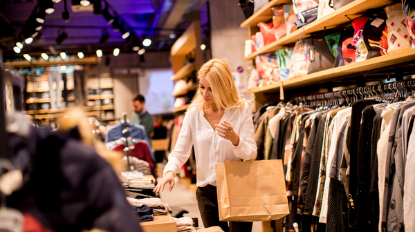 young woman shopping in a clothing store